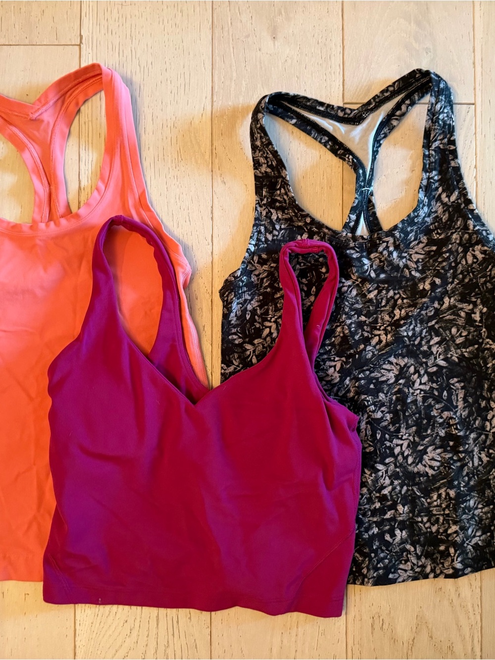 lululemon coral orange, magenta, black patterned tank tops